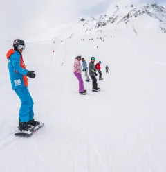 Cours collectif de snowboard